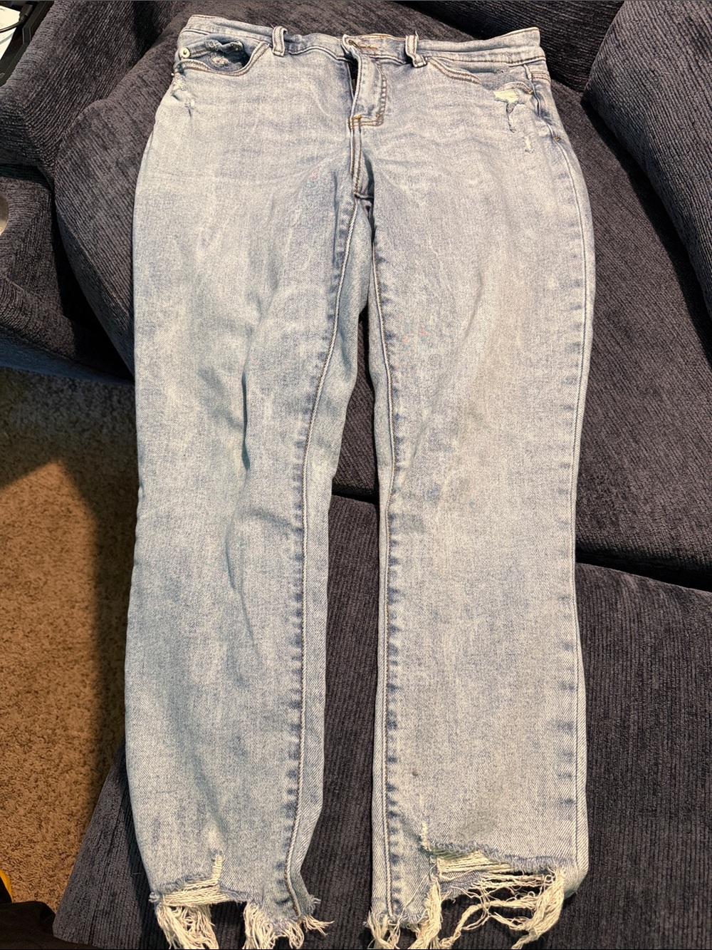Women's Light Wash Straight Leg Jeans with Distressed Hem